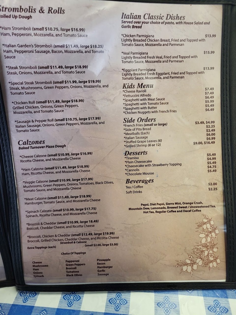 Menu page with pasta, subs, and desserts.